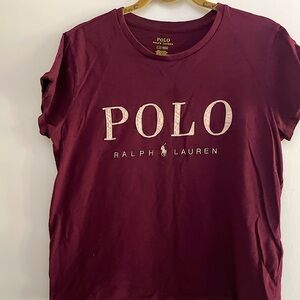 Woman’s wine colored size large POLO tshirt.